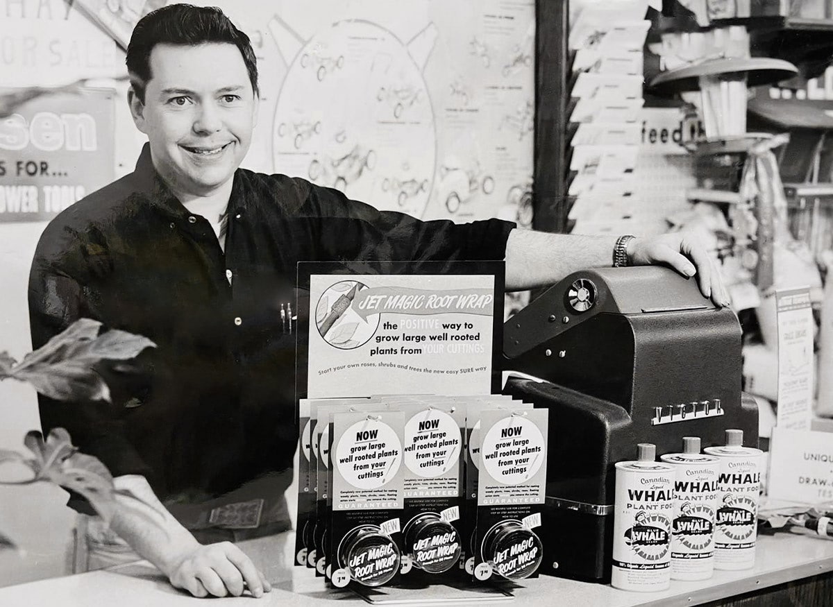 The Wishing Well's founder, Regis Raujol, works the cash register in a vintage promotional photo from the 1960s